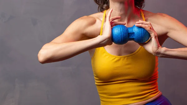 Woman with yoga props tools.  Muscular fascial warm-up. Myofascial release