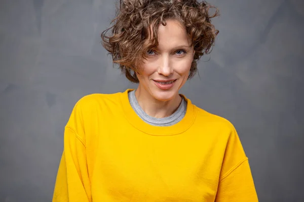 Happy Cheerful Young Woman Short Curly Hair Wearing Bright Yellow — Stock Photo, Image