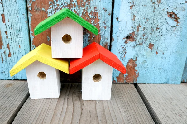 Colorful nesting boxes on blue — Stock Photo, Image