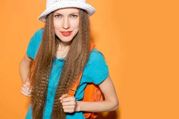 Happy tourist woman or study abroad woman with backpack — Stock Photo, Image