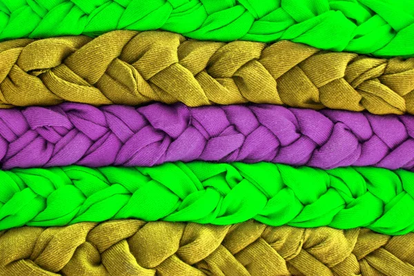 Kolorowe tło z tkaniny warkocze — Zdjęcie stockowe