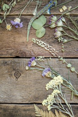 flowers on wooden background clipart