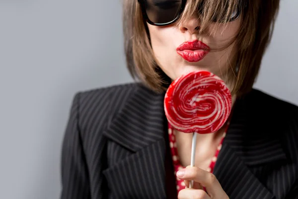 Woman with candy Stock Image