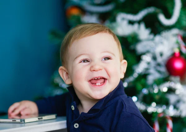 Blonde baby portret - baby lachen Stockafbeelding