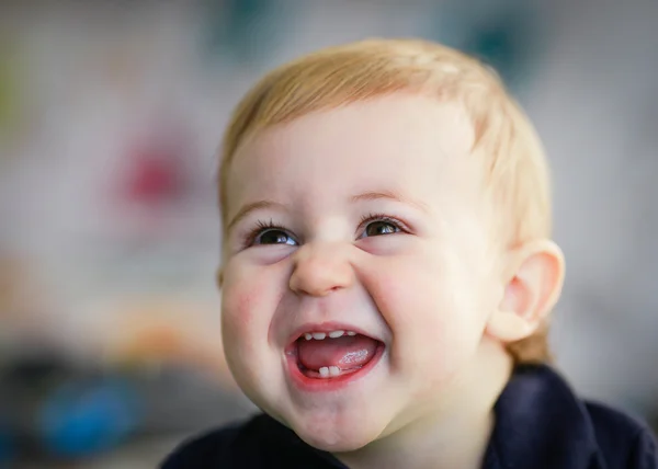 Blonde baby portret - baby lachen Rechtenvrije Stockfoto's