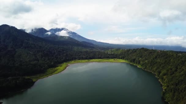 Aerial view over Lake Bratan and the surrounding areas of the Bedugul resort region of Bali — Stock Video