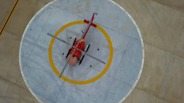 Aerial drone view of helipad sign. Helicopter helipad. helicopter helipad on the concrete surface with letter H view from above. Helicopters landing area makes us feel safe in case of emergency