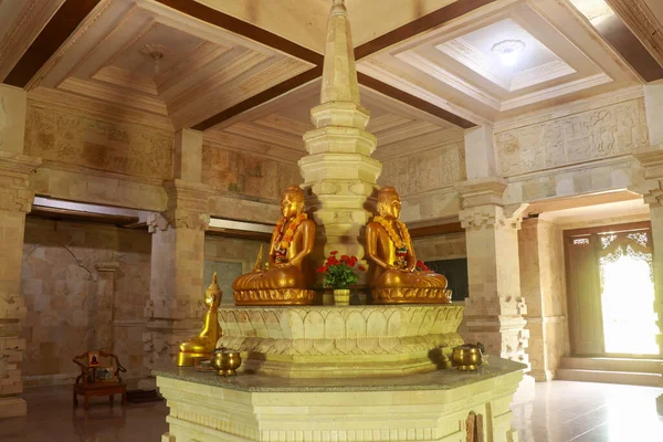 Golden Buddha in the Buddhist temple Brahma Vihara Arama, Bali, Indonesia. Yellow Buddha look beautiful — Stock Photo, Image