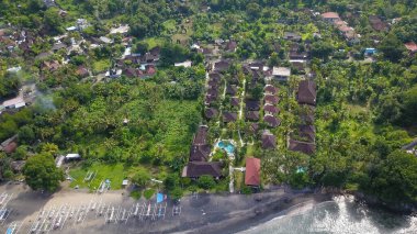 Aerial top down drone footage of the famous Finns beach club that lies on the famous Echo beach in Bali, Indonesia.
