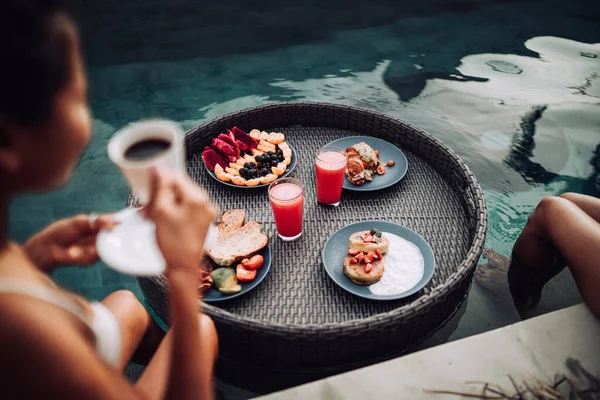 Girl Relaxing Eating Fruits Pool Luxury Villa Bali Exotic Summer Royalty Free Stock Images