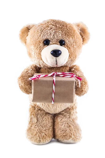 Teddy bear holding a gift box — Stock Photo, Image