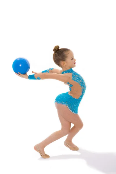 Girl gymnast on a white background with a ball — Stock Photo, Image