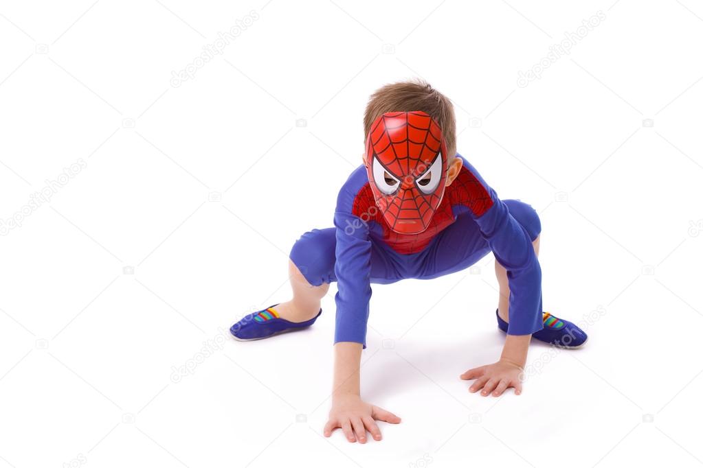 boy of five years in costume of Spider-Man