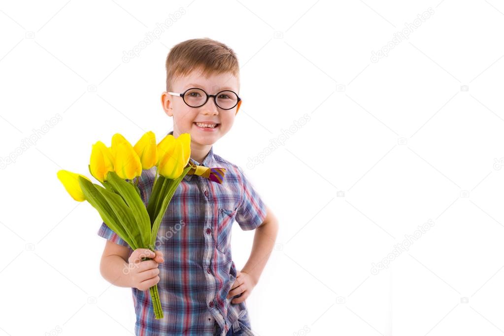 cute boy five years, with bouquet of tulips