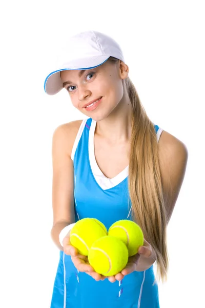 Beautiful girl holding a tennis ball — Stock Photo, Image