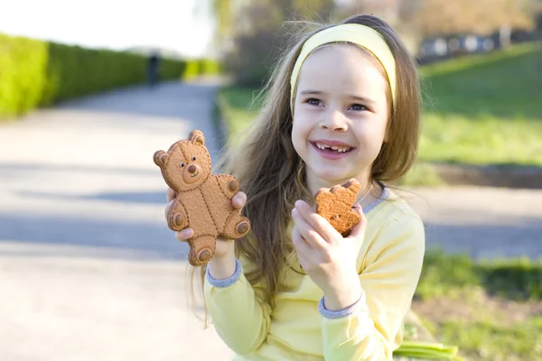 Girl and sweets — Stock Photo, Image