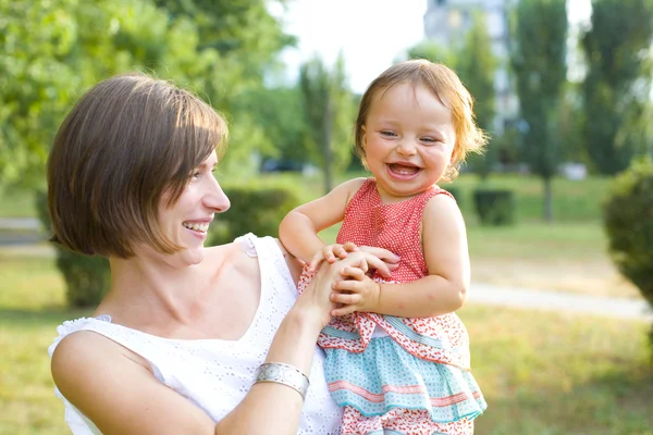 Mom and one year old daughter — Zdjęcie stockowe