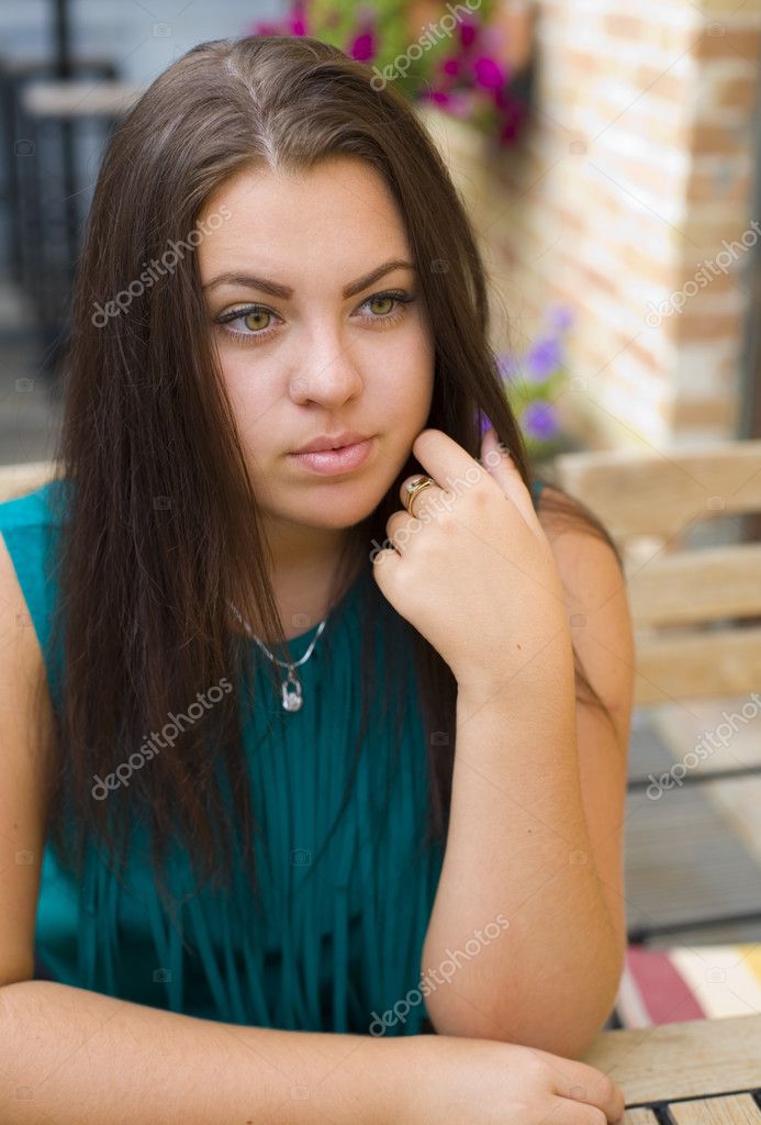 Beautiful young brunette Stock Photo by ©voronishcheva 76973431