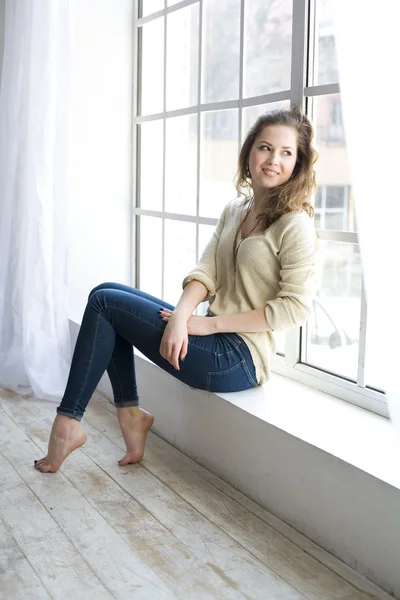 Studio portrait of a beautiful young brown-haired — Stockfoto