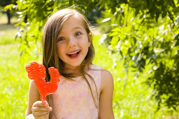 Mädchen und ein Lutscher — Stockfoto