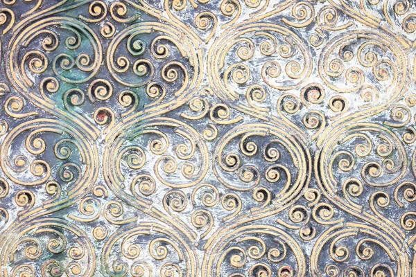 Grunge golden spiral texture on the wall — Stock Photo, Image