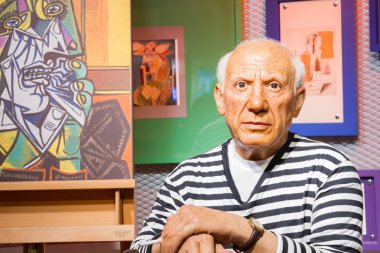 BANGKOK, THAILAND - DECEMBER 19: Wax figure of the famous Pablo Picasso from Madame Tussauds on December 19, 2015 in Bangkok, Thailand clipart