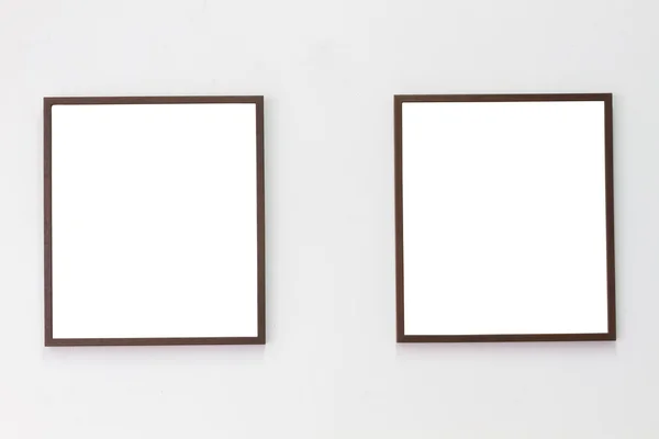 Foto horizontal de dois moldura da foto no fundo da parede em branco, copyspace . — Fotografia de Stock