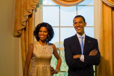 BANGKOK, THAILAND - DECEMBER 19: A waxwork of Barack and Michelle Obama on display at Madame Tussauds on December 19, 2015 in Bangkok, Thailand
