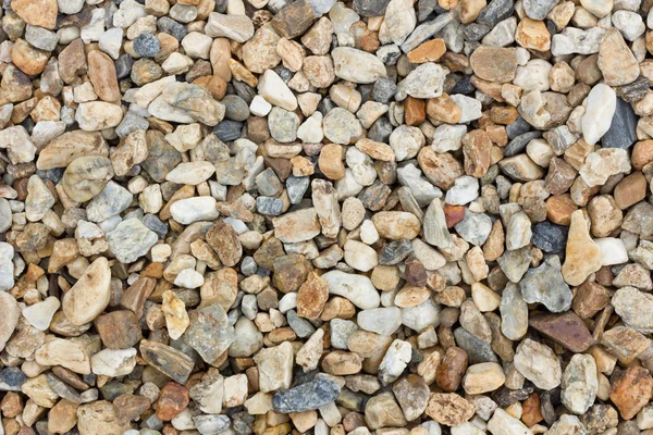 Fundo é textura de pedras de calhau — Fotografia de Stock