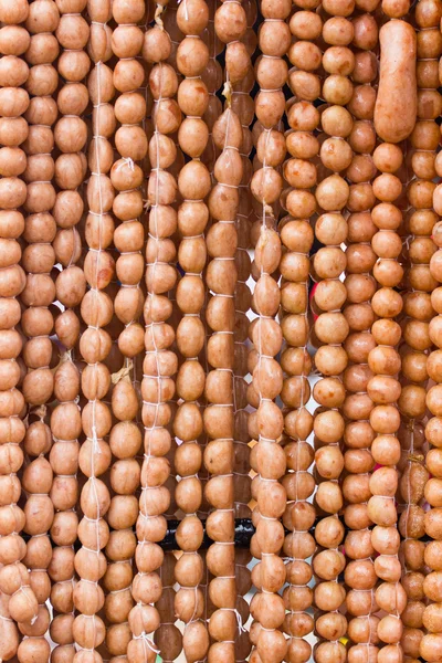 Traditional Thai food, pork sausage at street market, Thailand. — Stock Photo, Image