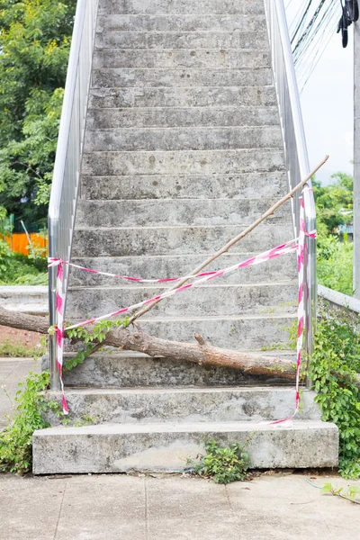 Abandoned Flyover stairs with log and plastic lines. — Stock Photo, Image