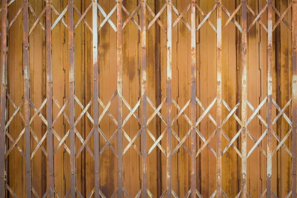 Viejo y oxidado fondo de la puerta de hierro — Foto de Stock