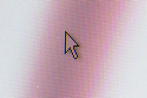 Close-up of cursor on monitor