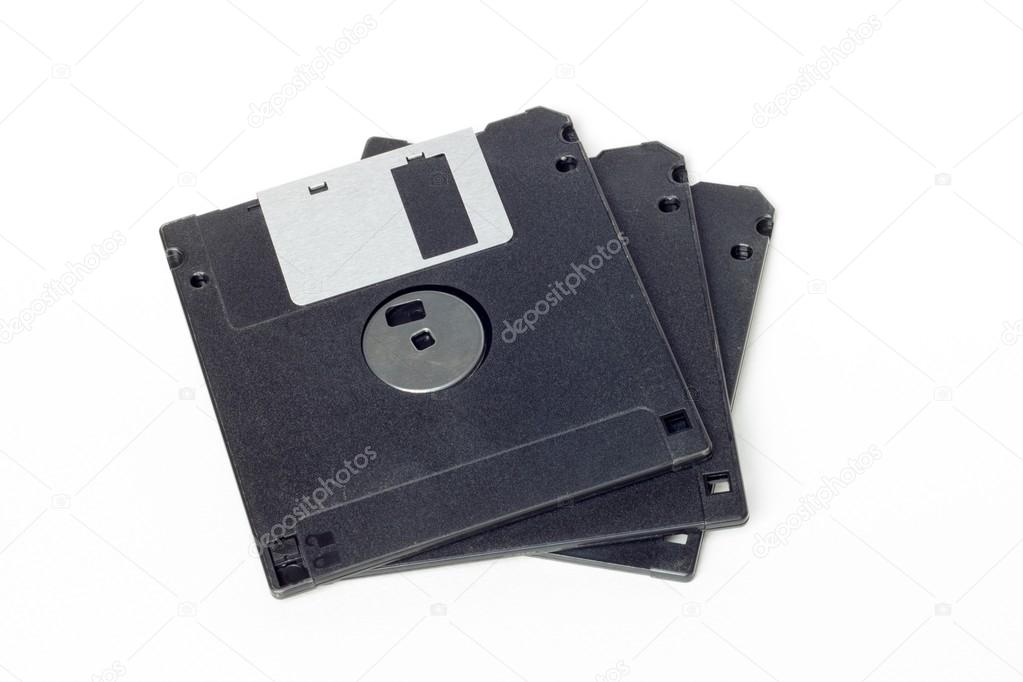 stack of black diskettes isolated on white background