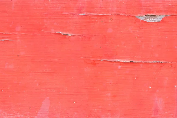 Gros plan de vieille texture de panneau de bois peint sur rouge — Photo