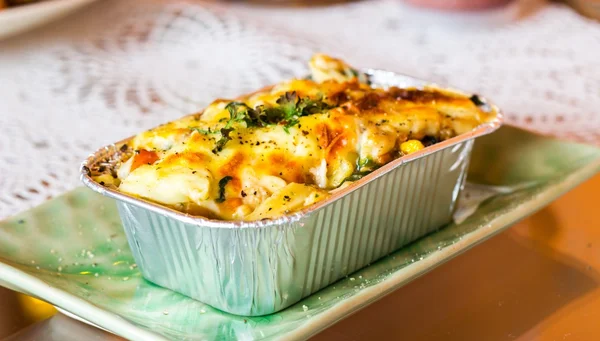 Lasagne ready meal in foil container. — Stock Photo, Image
