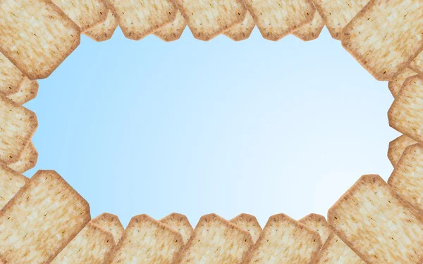 Frame made of cracker on beautiful gradient — Stock Photo, Image