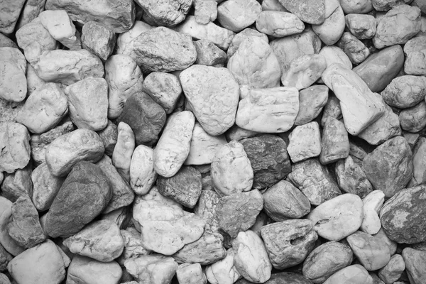 Close-up small rock texture on the ground, background, black and — Stock Photo, Image