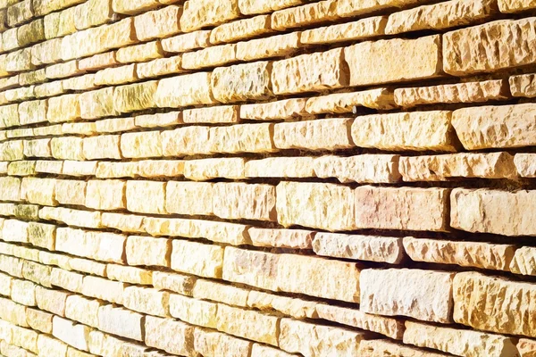 Perspectiva de la vieja pared de ladrillo amarillo — Foto de Stock