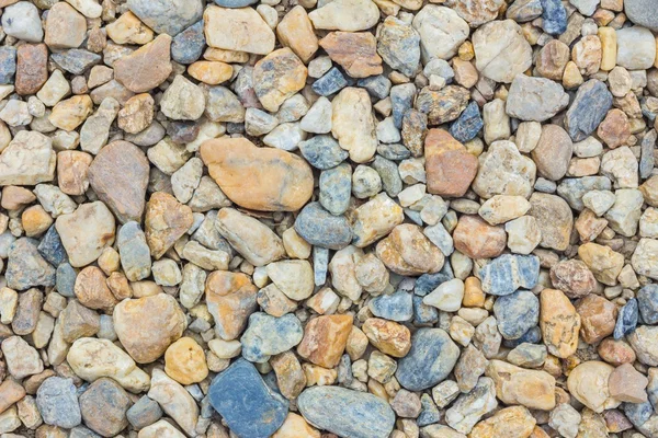 Textura de pedras de seixos coloridos na praia — Fotografia de Stock