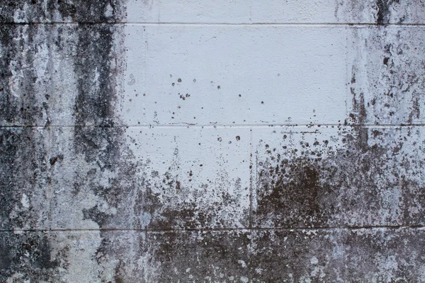 Nahaufnahme einer grauen Grunge-Wand — Stockfoto