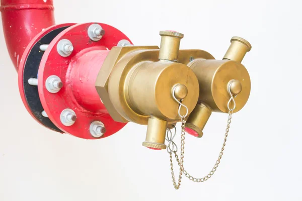 Soft focus water valves for Fire protection on white wall — Stock Photo, Image