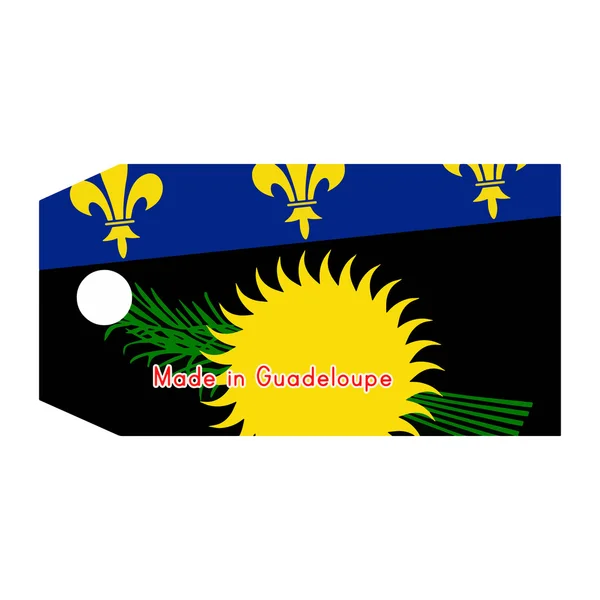 Guadeloupe flag on price tag with word Made in Guadeloupe isolat — Stockový vektor