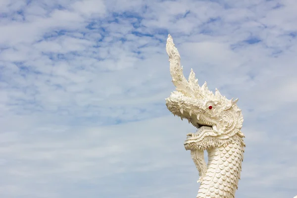 Serpent king or king of naga statue in thai temple in background — Stock Photo, Image