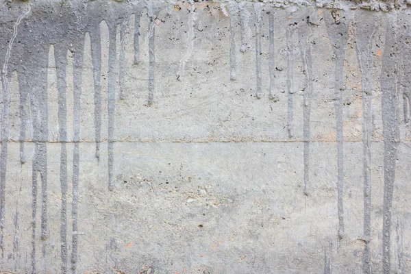 Pared de hormigón con gotas de cemento y copyspace en el centro . —  Fotos de Stock