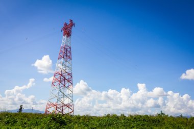 telecommunication tower and blue clear sky with copyspace  clipart