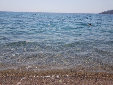 Azure and clear sea on the Bodrum beach, Mugla, Turkey