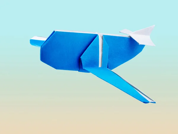 Origami blå flygplan — Stockfoto