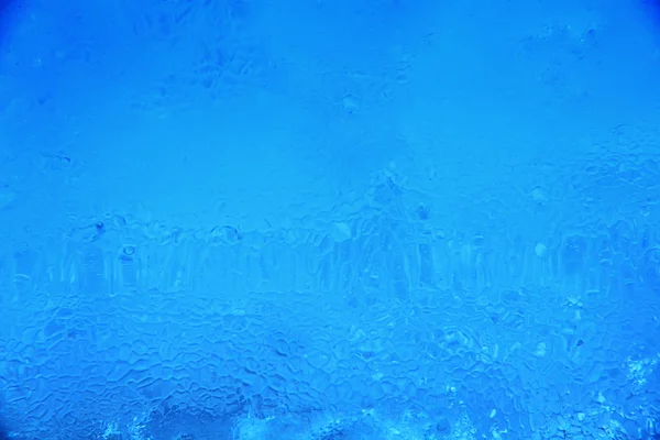 Hielo raro fondo azul —  Fotos de Stock