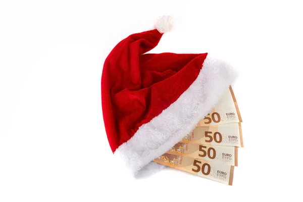 Weihnachtsmütze Und Euro Banknoten Auf Weißem Hintergrund — Stockfoto
